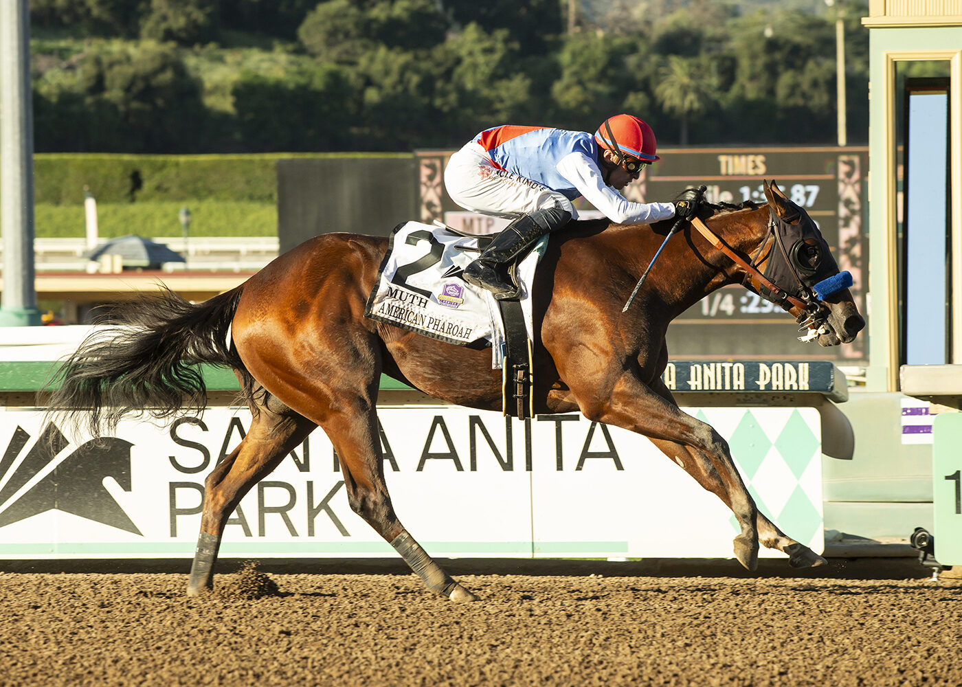 Muth winning a horse race at Santa Anita