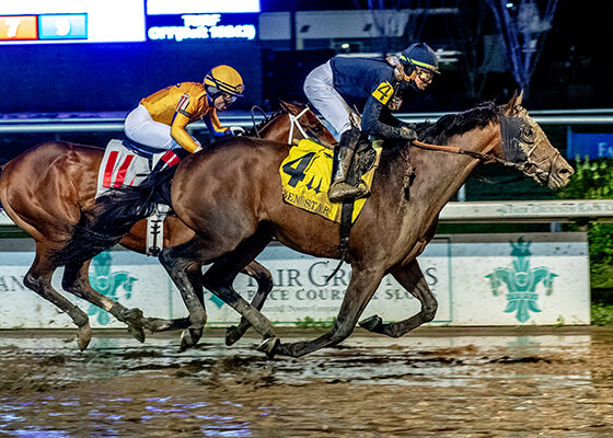 Sierra Leone winning the Risen Stakes at Fair Grounds in horse racing action