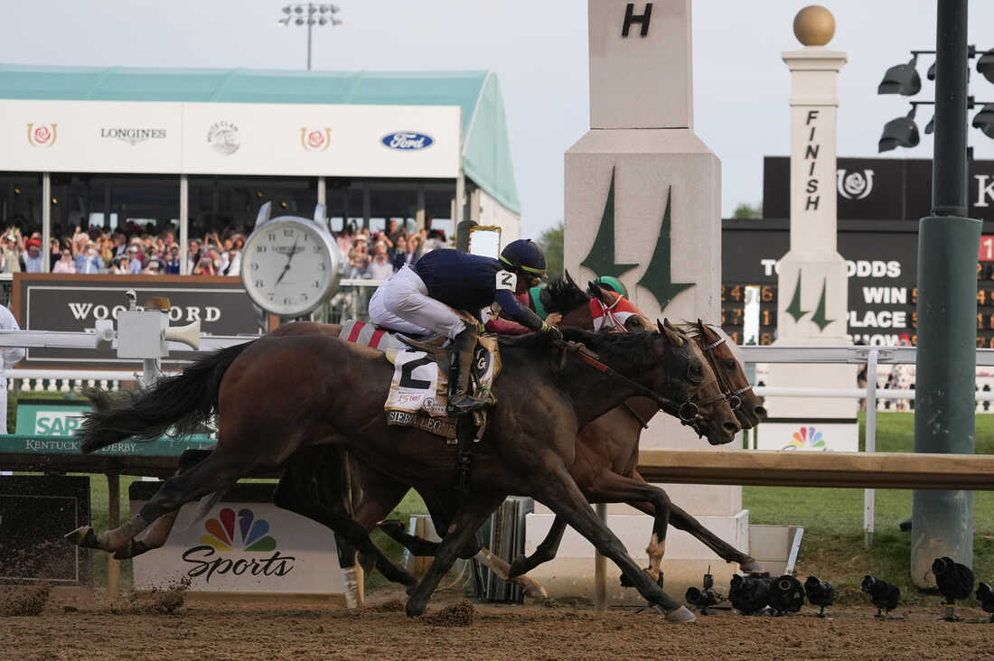 Mystik Dan edging out the win in the 150th Kentucky Derby