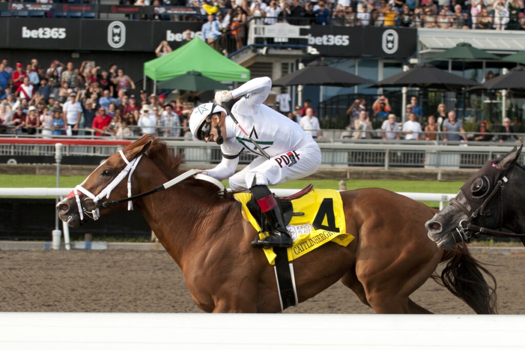 Caitlinhergrtness winning the 165th King's Plate at Woodbine