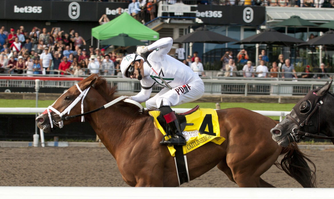 Caitlinhergrtness winning the 165th King's Plate at Woodbine